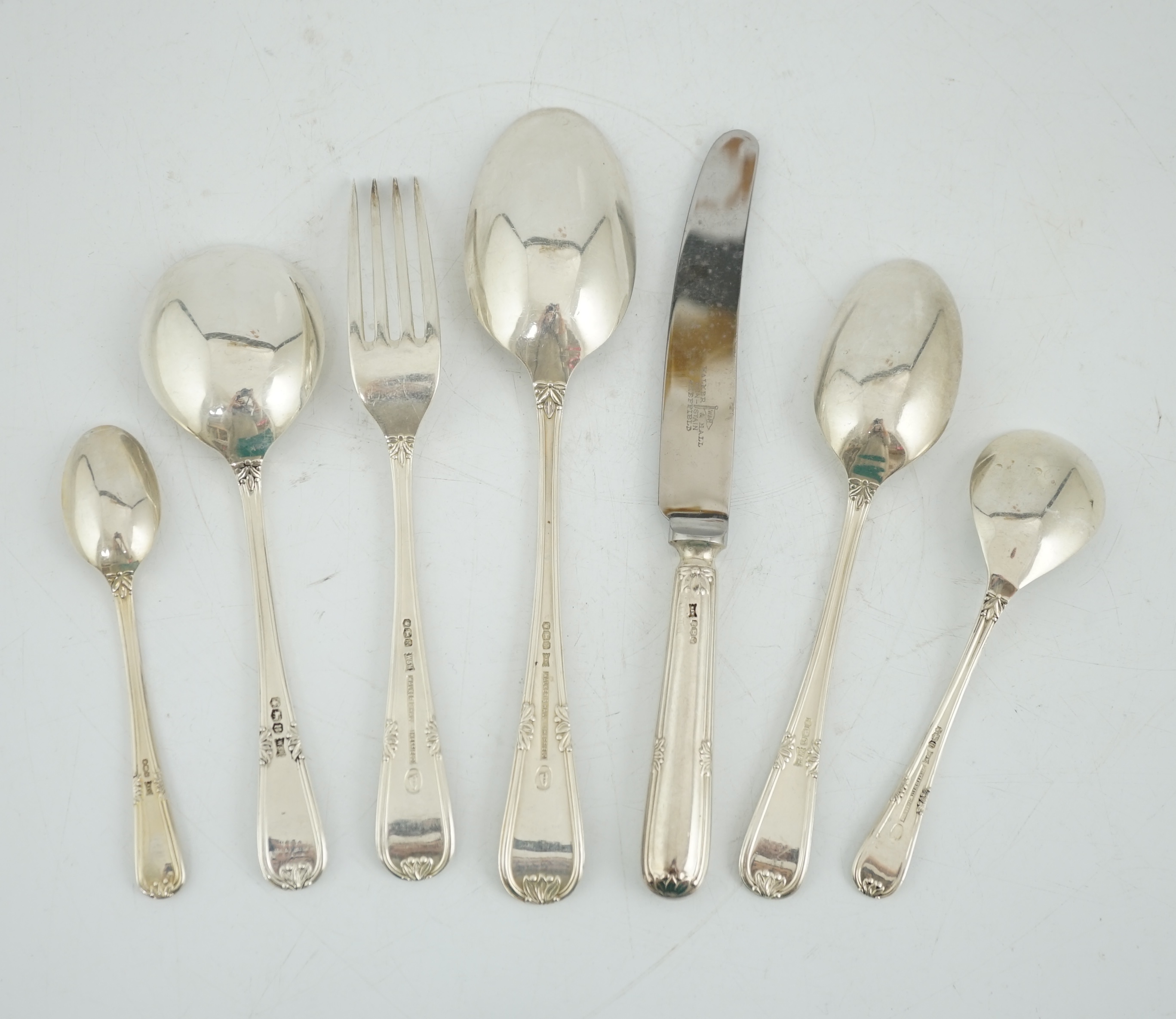 An Elizabeth II canteen of silver cutlery for six, by Walker & Hall